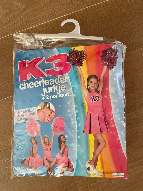 K3 cheerleader jurk 6-8 jaar, maat 128-134 nieuw!, Kinderen en Baby's, Carnavalskleding en Verkleedspullen, Zo goed als nieuw