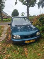 Nissan Micra 1.0 E 16V AUTOMAAT, Auto's, Stof, 54 pk, 4 cilinders, 450 kg