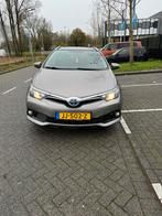 Toyota Auris 1.8 Hybrid Touring Sports CVT 2016 Bruin, Auto's, 65 €/maand, 28 km/l, Bruin, Origineel Nederlands