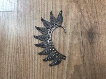 Moost wanted Ear piece beschikbaar voor biedingen