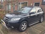 Hyundai Santa Fe 2.7 2WD 7-ST 2006 Zwart, Auto's, Hyundai, Voorwielaandrijving, Santa Fe, Beige, 2000 kg