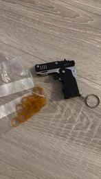 elastiek schieter, Verzamelen, Sleutelhangers, Ophalen of Verzenden, Zo goed als nieuw