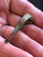 Romeins bodemvondst FIBULA model WOLFSKOP apart, Ophalen of Verzenden, Brons