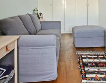 Ikea Gronlid 2-zits slaapbank en voetenbank met opbergruimte beschikbaar voor biedingen