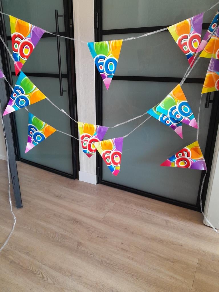 Slinger 60 jaar - Kleurrijke Feestversiering, Ophalen of Verzenden, Zo goed als nieuw, Versiering, Verjaardag