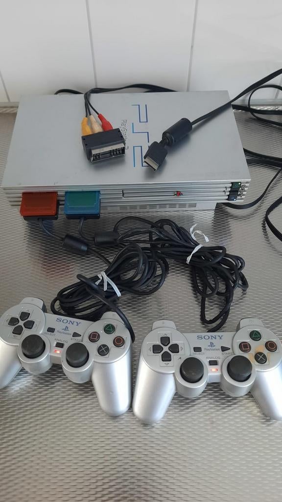 PlayStation 2 Slim met 2 controllers, Ophalen