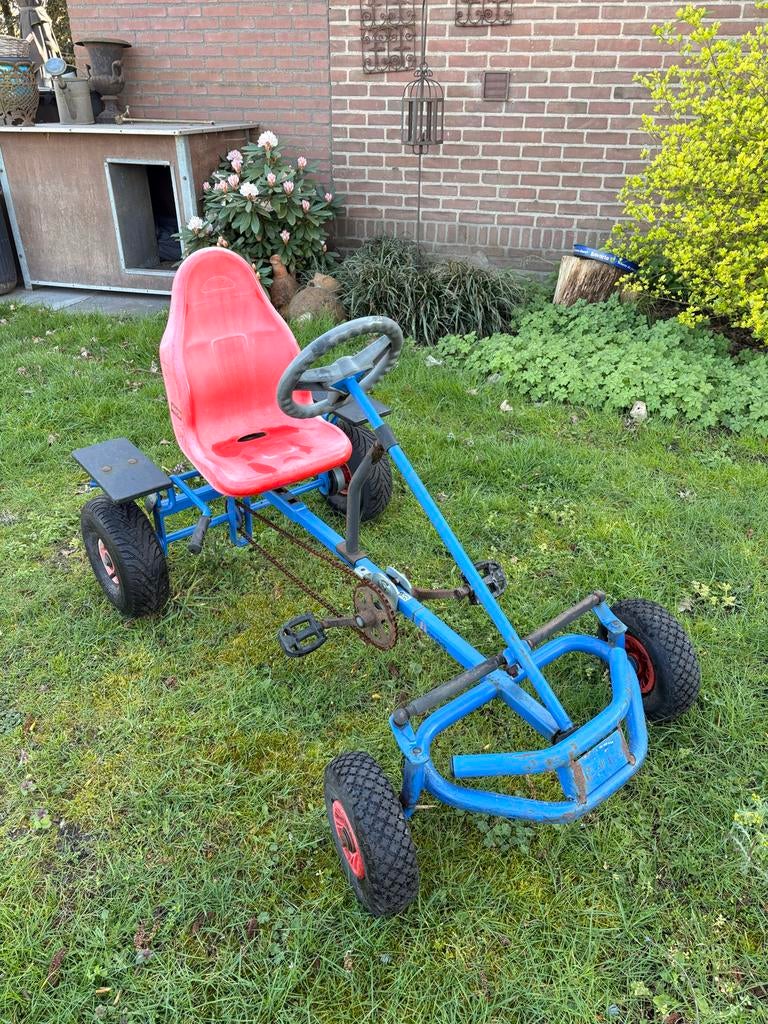 Blauwe skelter met rode zitting, Ophalen, Gebruikt, Overige merken