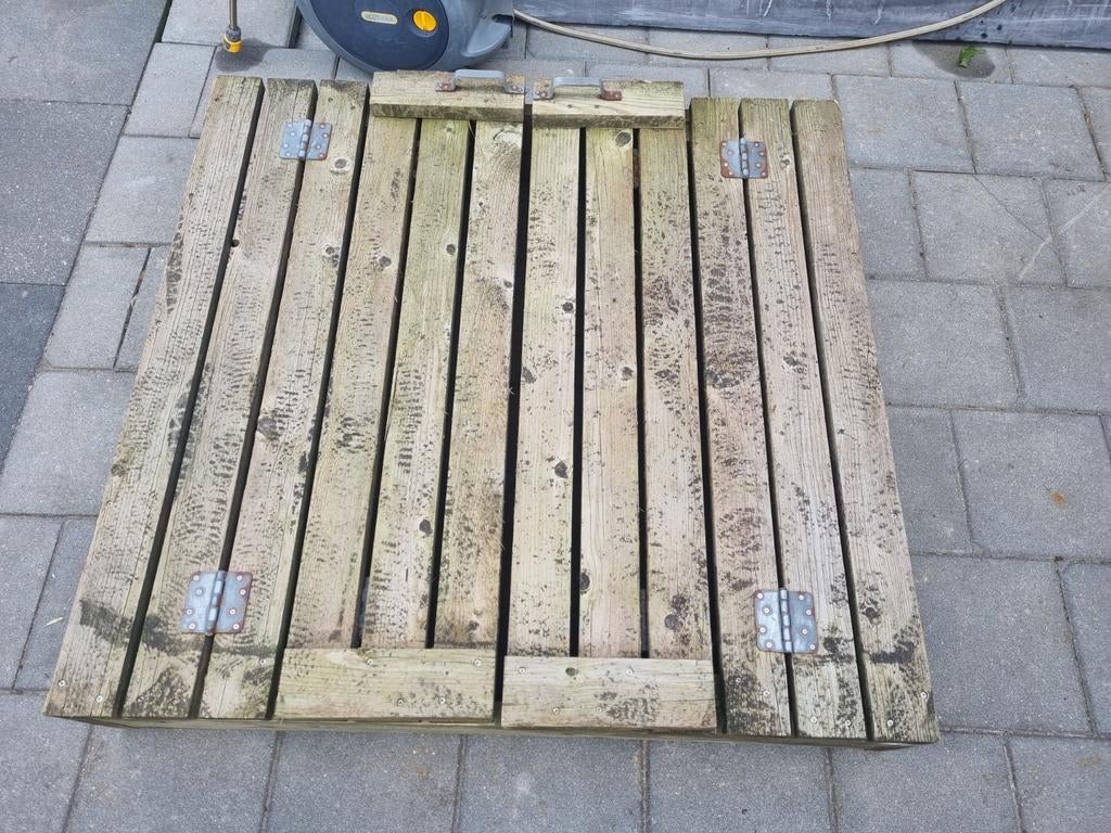 Zandbak met bankje, Ophalen