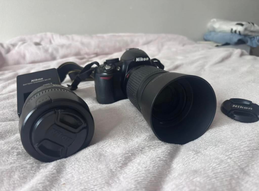 Nikon D3100, Ophalen of Verzenden, Zo goed als nieuw, 8 tot 12x, Dakkant (recht)