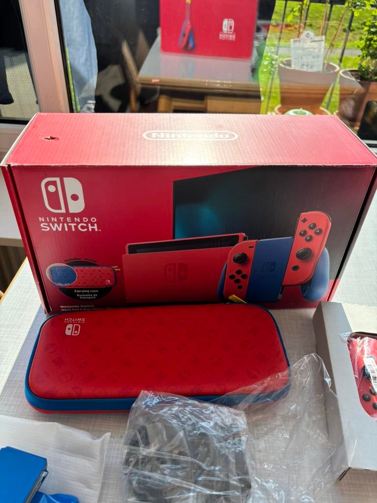 Nintendo switch mario edition met games en extra controllers, Ophalen of Verzenden, Zo goed als nieuw, Switch Original, Met games
