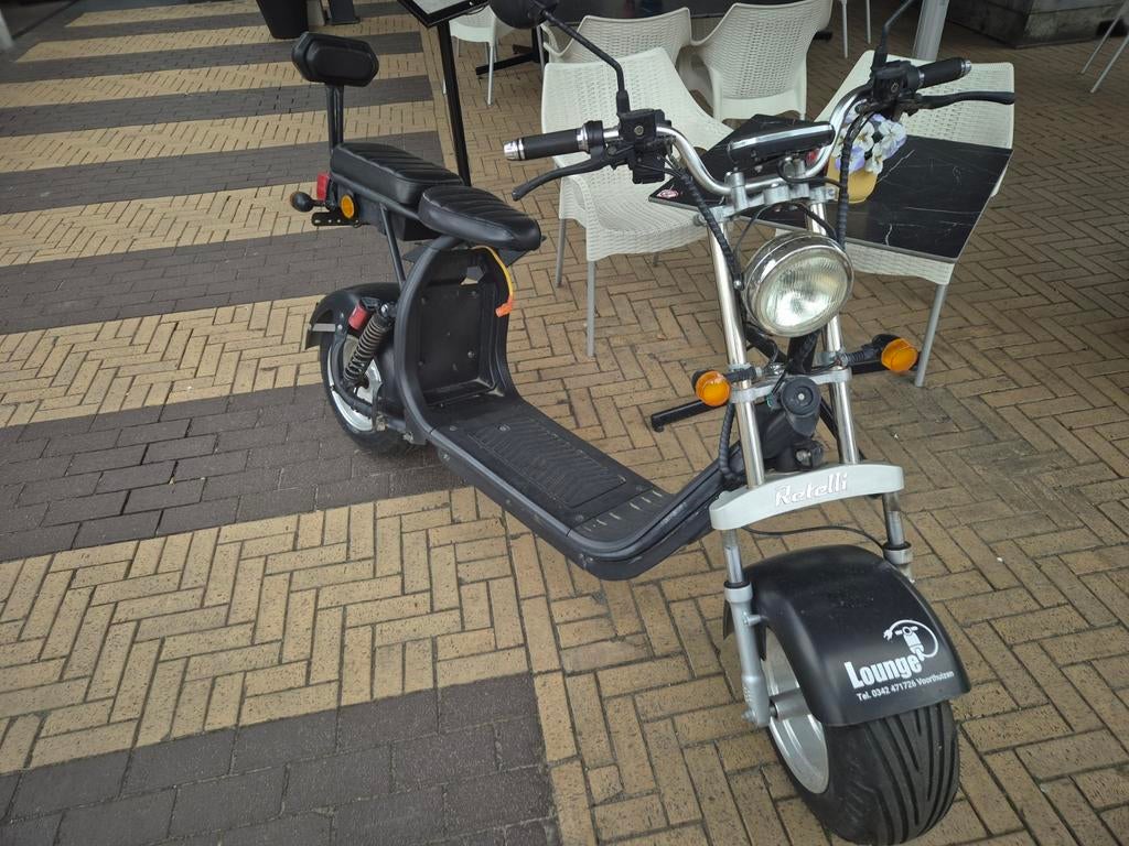 E-chopper met dubbele buddyseat, Ophalen