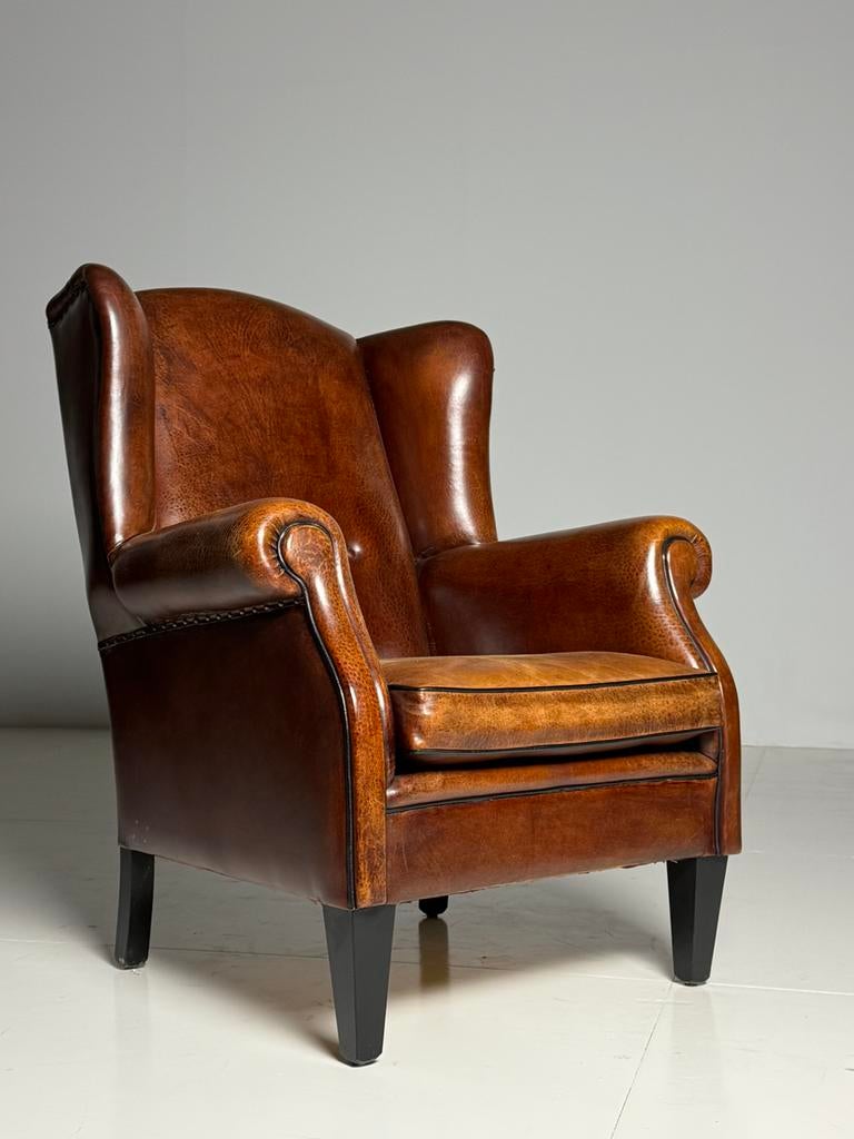 Wingback fauteuil schapenleer klassiek, Huis en Inrichting, Fauteuils, Zo goed als nieuw, 75 tot 100 cm, Ophalen