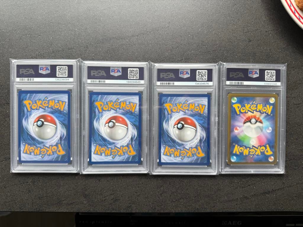 4 Gegrade Pokémon Kaarten PSA 9 - Guzzlord, Lucario, Snorlax, Ophalen of Verzenden, Zo goed als nieuw, Meerdere kaarten