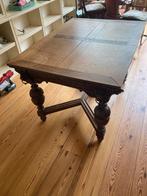 Antieke tafel met leeuwenkoppen, Mechelen, Ophalen