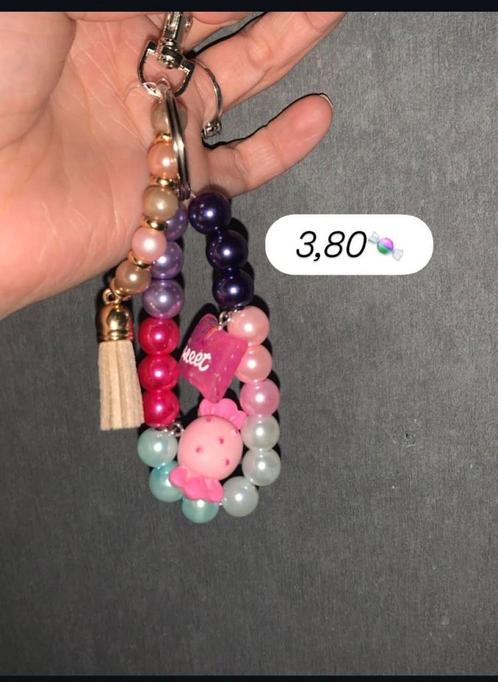 Leuke vrolijke sleutel hanger, Sieraden, Tassen en Uiterlijk, Oorbellen, Nieuw, Overige materialen, Zilver, Ophalen of Verzenden