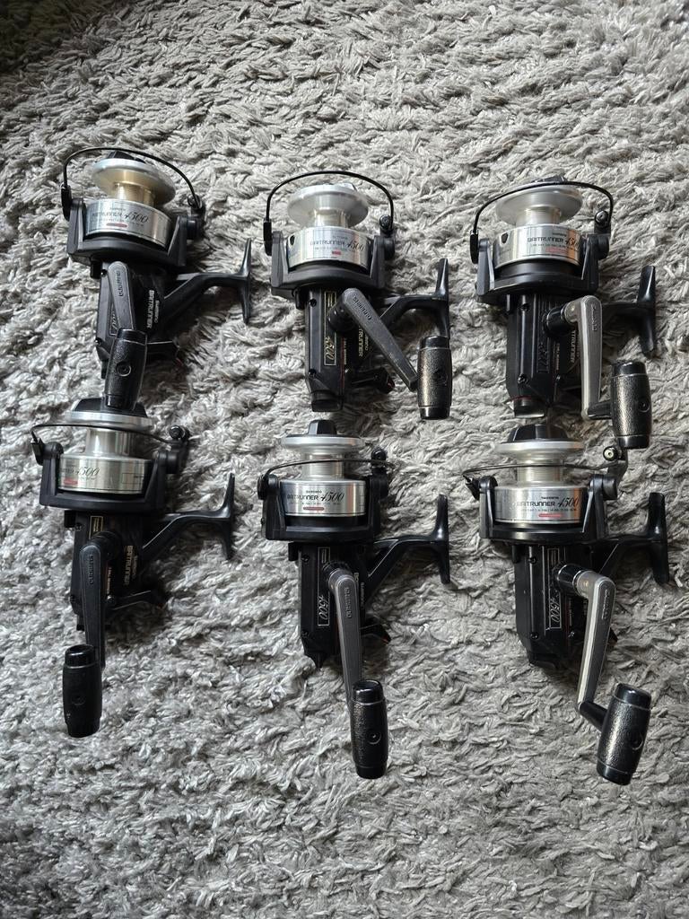 8x shimano baitrunner 4500a, Ophalen of Verzenden, Molen