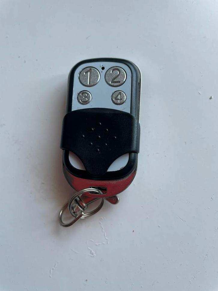 Handige afstandsbediening garagedeur Mhouse, Audio, Tv en Foto, Afstandsbedieningen, Ophalen