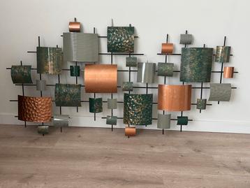 Metalen muurdecoratie beschikbaar voor biedingen