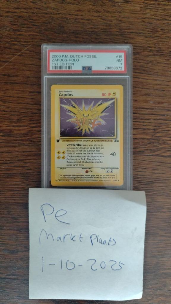 Zapdos 1st edition Fossil Dutch PSA 7 #15 pokemon kaart 2000, Hobby en Vrije tijd, Verzamelkaartspellen | Pokémon, Zo goed als nieuw