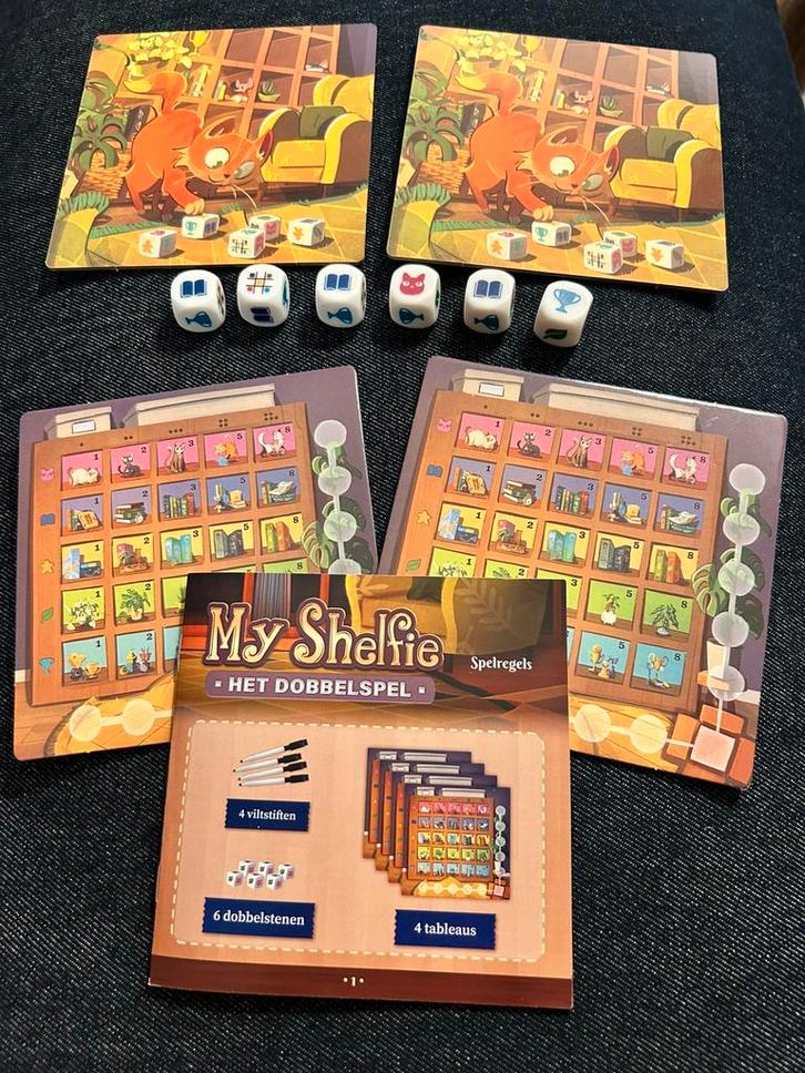 My Shelfie Het Dobbelspel Gezelschapsspel 2-4 Spelers 8-99 J, Hobby en Vrije tijd, Gezelschapsspellen | Bordspellen, Zo goed als nieuw