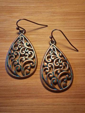 vintage boho bronskleurige oorbellen krul beschikbaar voor biedingen