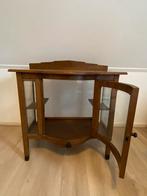 Antiek vitrinekastje, Ophalen