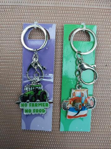 21 sleutelhangers. Trekker met tekst: No Farmer no Food e.a. beschikbaar voor biedingen
