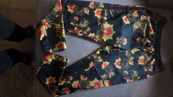 Nike Trainingsbroek Bloemenprint Maat L beschikbaar voor biedingen