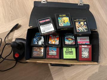 Atari games in tas en controller beschikbaar voor biedingen