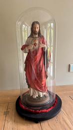 Heilig beeld in een stolp, Ophalen