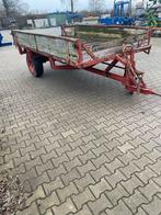 Mestkar met werkende bodemketting en aftakas, Ophalen