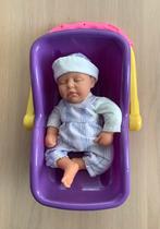 Pop ong. 25 cm in een maxi cosi., Kinderen en Baby's, Ophalen of Verzenden, Gebruikt, Babypop