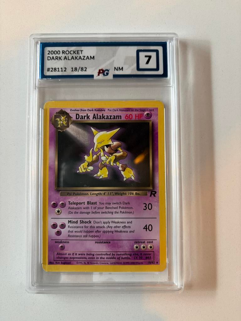 Rocket Dark Alakazam, Ophalen of Verzenden, Zo goed als nieuw, Losse kaart