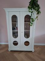 Vitrinekast met ronde glazen, Ophalen