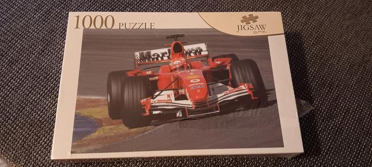 Puzzel F1 Ferrari 1000 stukjes nieuw in folie, Hobby en Vrije tijd, Denksport en Puzzels, Zo goed als nieuw, Legpuzzel, 500 t/m 1500 stukjes