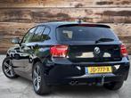 BMW 1-serie 125i High Executive Sport | Full Options | Zeer, Achterwielaandrijving, Gebruikt, Zwart, Navigatiesysteem