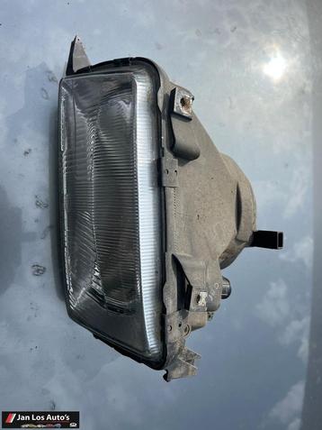 Audi 80 B4 koplamp links Hella met hoogteregeling beschikbaar voor biedingen