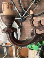 Houten kroonluchter, Ophalen