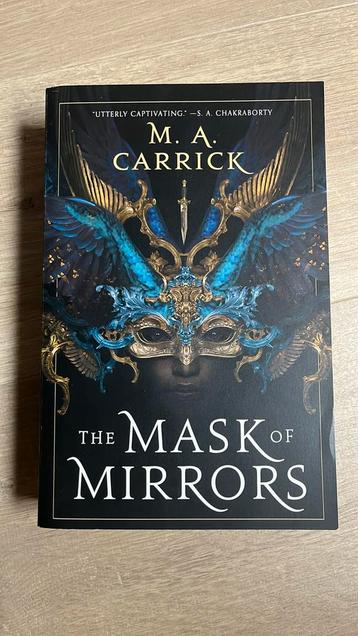 The Mask of Mirrors - M.A. Carrick (Engels) beschikbaar voor biedingen