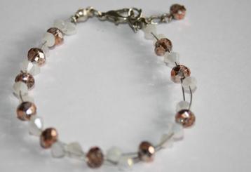 Armband in wit en copper met mooie glans beschikbaar voor biedingen