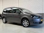Volkswagen Touran 1.2 TSI Comfortline BlueMotion 7p., Voorwielaandrijving, Euro 5, Stof, Zwart