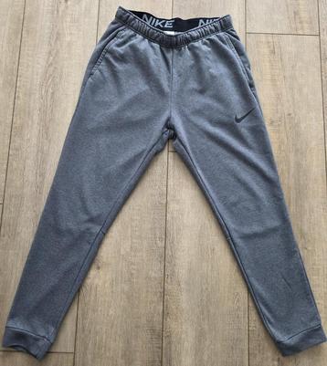 Nike Dri-fit trainingsbroek grijs maat L beschikbaar voor biedingen