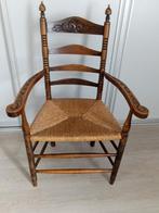 Antieke stoel met rotan zitting, Ophalen