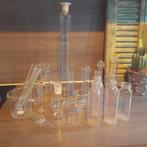 Verzameling diverse laboratorium glas, Ophalen