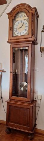 Staande klok, Ophalen