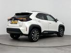 Toyota Yaris Cross 1.5 Hybrid Dynamic Limited (bj 2024), Stof, Gebruikt, Met garantie (alle), 116 pk