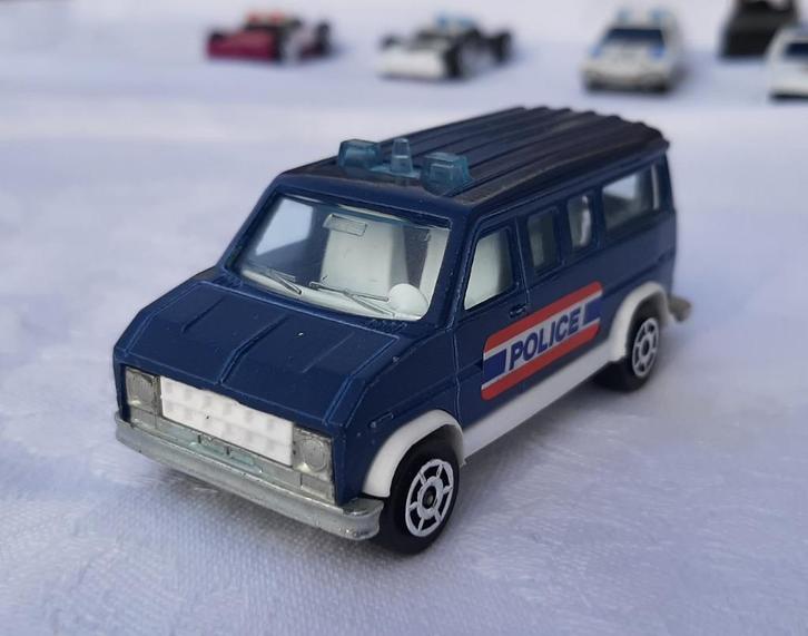 Fourgon van Marjorette Police, Hobby en Vrije tijd, Modelauto's | Overige schalen, Nieuw, Auto, Ophalen of Verzenden