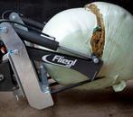 Fliegl balensnijder, Ophalen