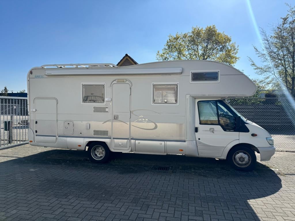 Camper Rimor Superbrig 680TC–7 slaapplaatsen, met XXL garage, Afzuigkap, Alkoof, Luifel, Ford