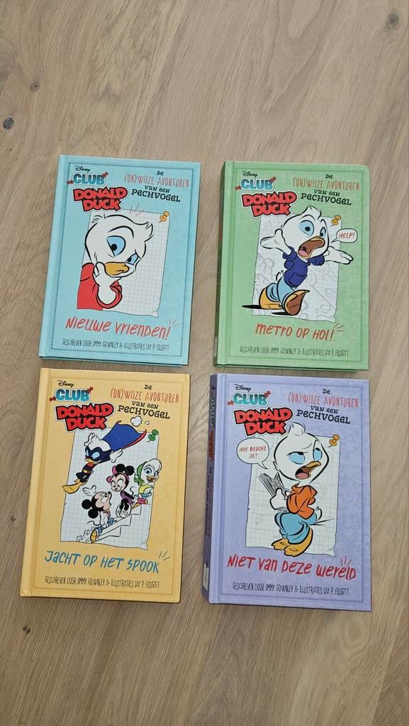 Donald Duck Club boeken deel 1 t/4, Boeken, Humor, Gelezen, Verhalen, Ophalen of Verzenden